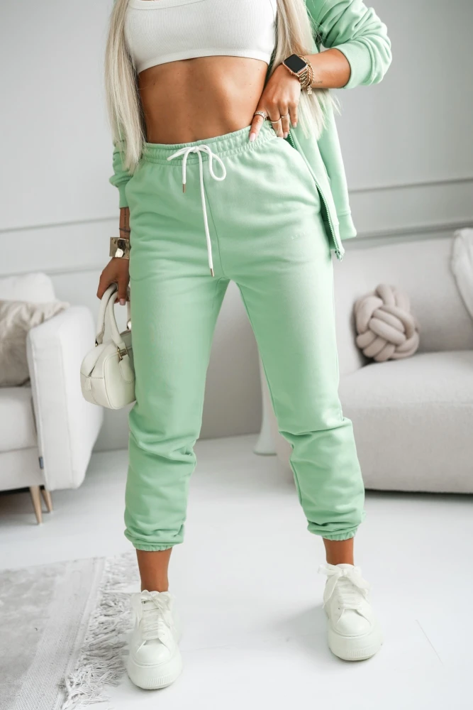 SPODNIE BAWEŁNIANE DRESOWE NA GUMĘ W PASIE Z MINIMALISTYCZNYM NAPISEM PISTACJOWE